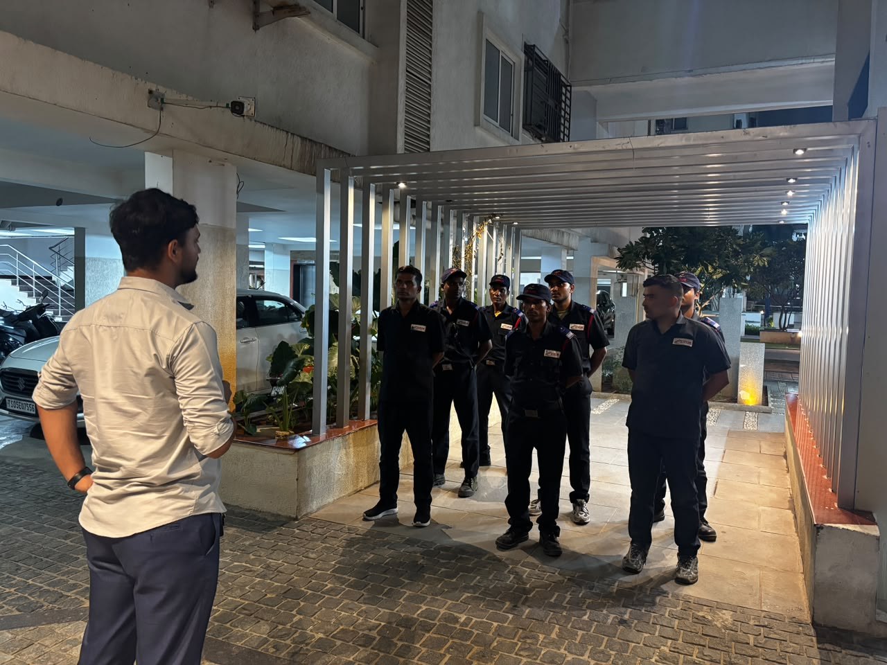 Evening briefing at site entrance